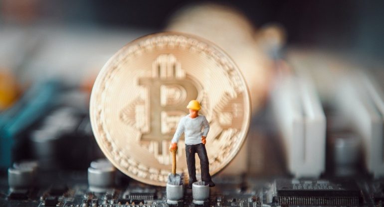 golden coin symbol bitcoin on mother board Blockchain , cryptocurrencies , bitcoin and distributed ledger technology concept. golden coin symbol bitcoin on mother board Blockchain , cryptocurrencies , bitcoin and distributed ledger technology concept.